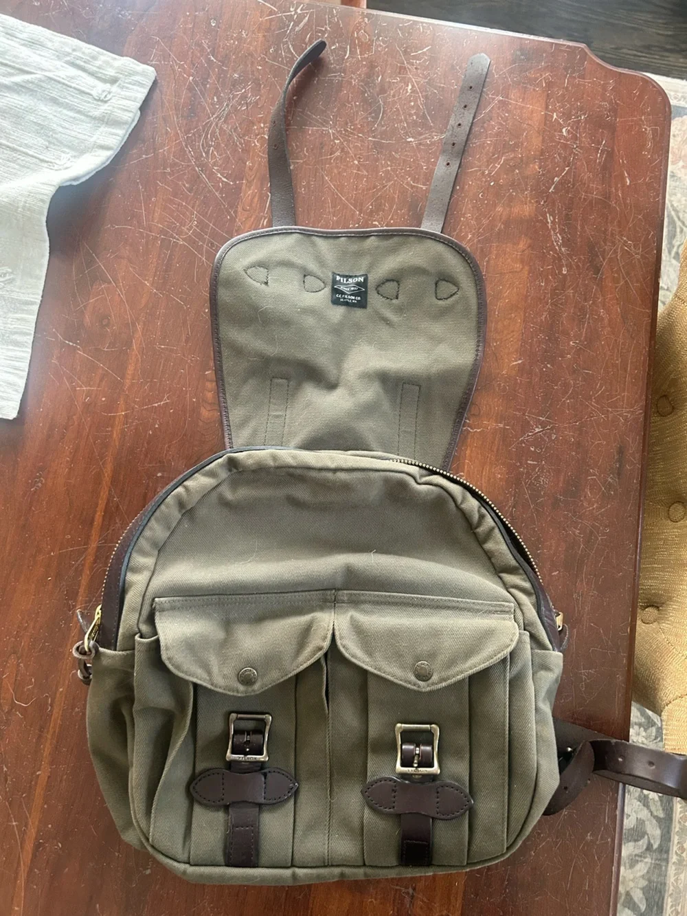 Filson Olive Green Canvas Backpack with Brown Leather Trim